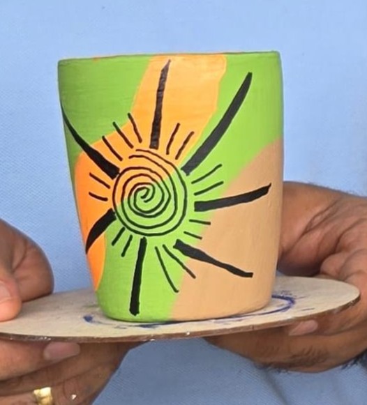 Handmade boho-style pottery decor with earthy and pastel tones.