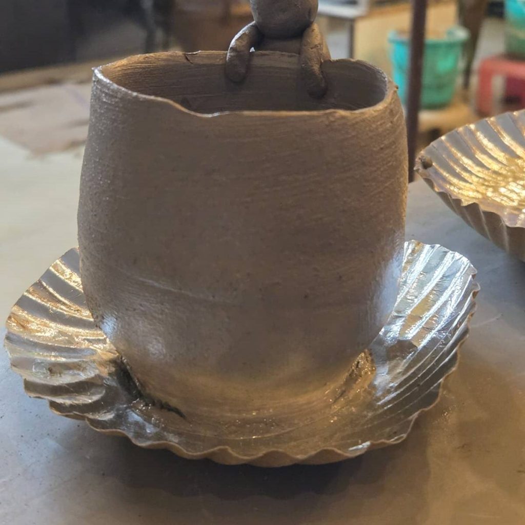 Decorative ceramic sculpture with artistic hand finishing.