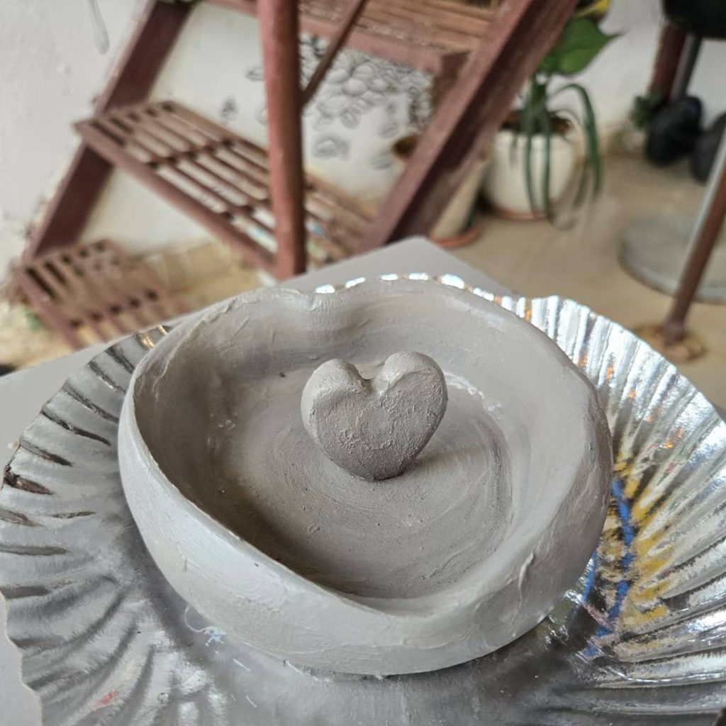Clay sculpture workshop in progress at Pastel Mystery.