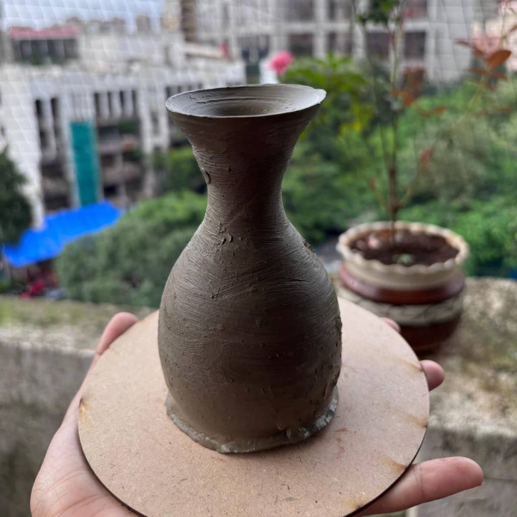 Modern pottery sculpting designs inspired by natural forms.