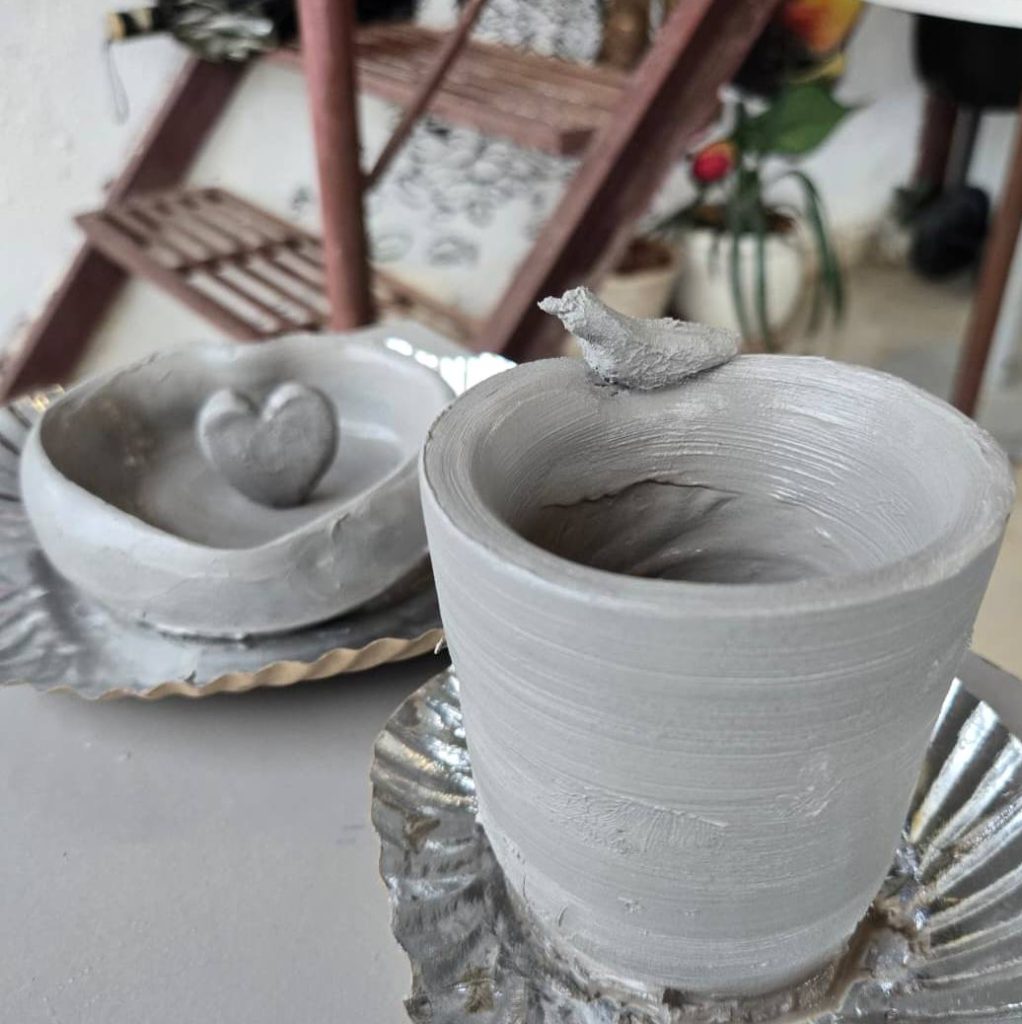 Intricate ceramic carving artwork by Pastel Mystery.