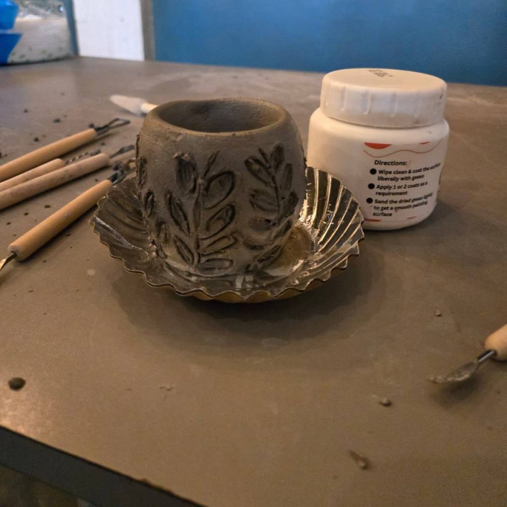 Pottery relief carving wall art featuring intricate handmade details